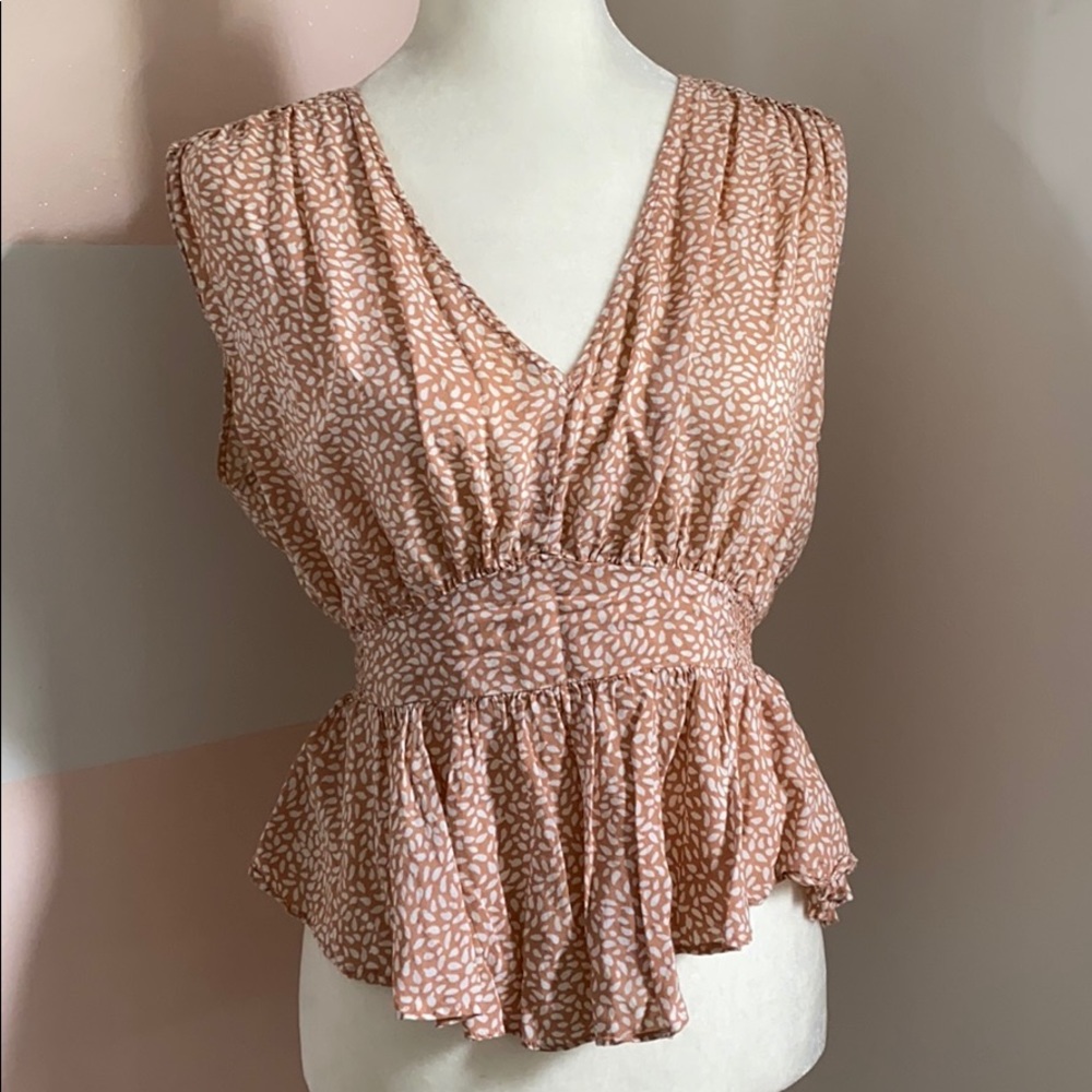Soft pink and white top, with singed waist